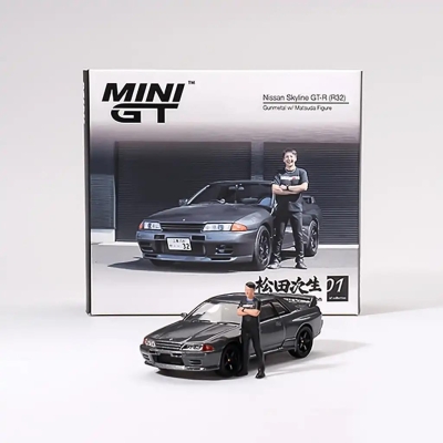 Mini GT 1/64 Nissan Skyline GT-R (R32) Gunmetal W/ Matsuda Figure